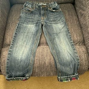 Boys jeans. Plaid material on bottom to roll up